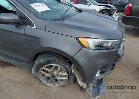 2022 Ford Edge Sel z USA, uszkodzony, nr VIN 2FMPK4J9XNBA89879